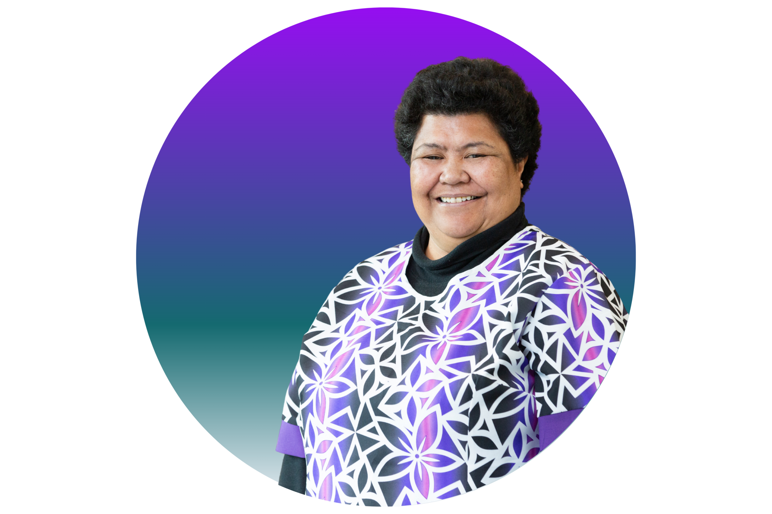 Betty is wearing a top with purple and black patterns. Sne is a middle aged Pasifika woman with short curly hair.